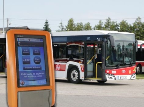 Zdjęcie autobusu, na przodzie zdjęcia kasownik do biletów.